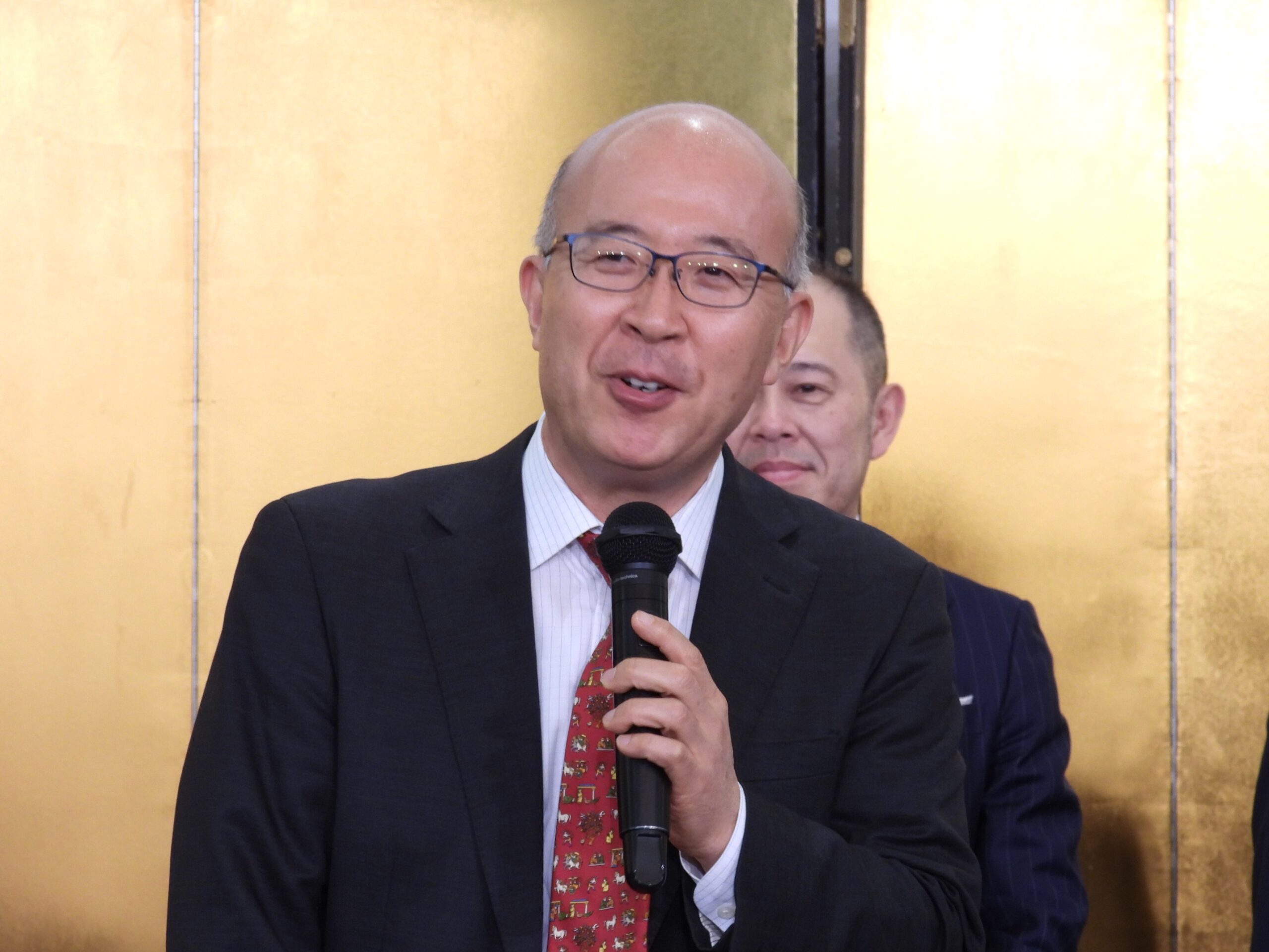 観光庁地域振興部長の長﨑敏志氏